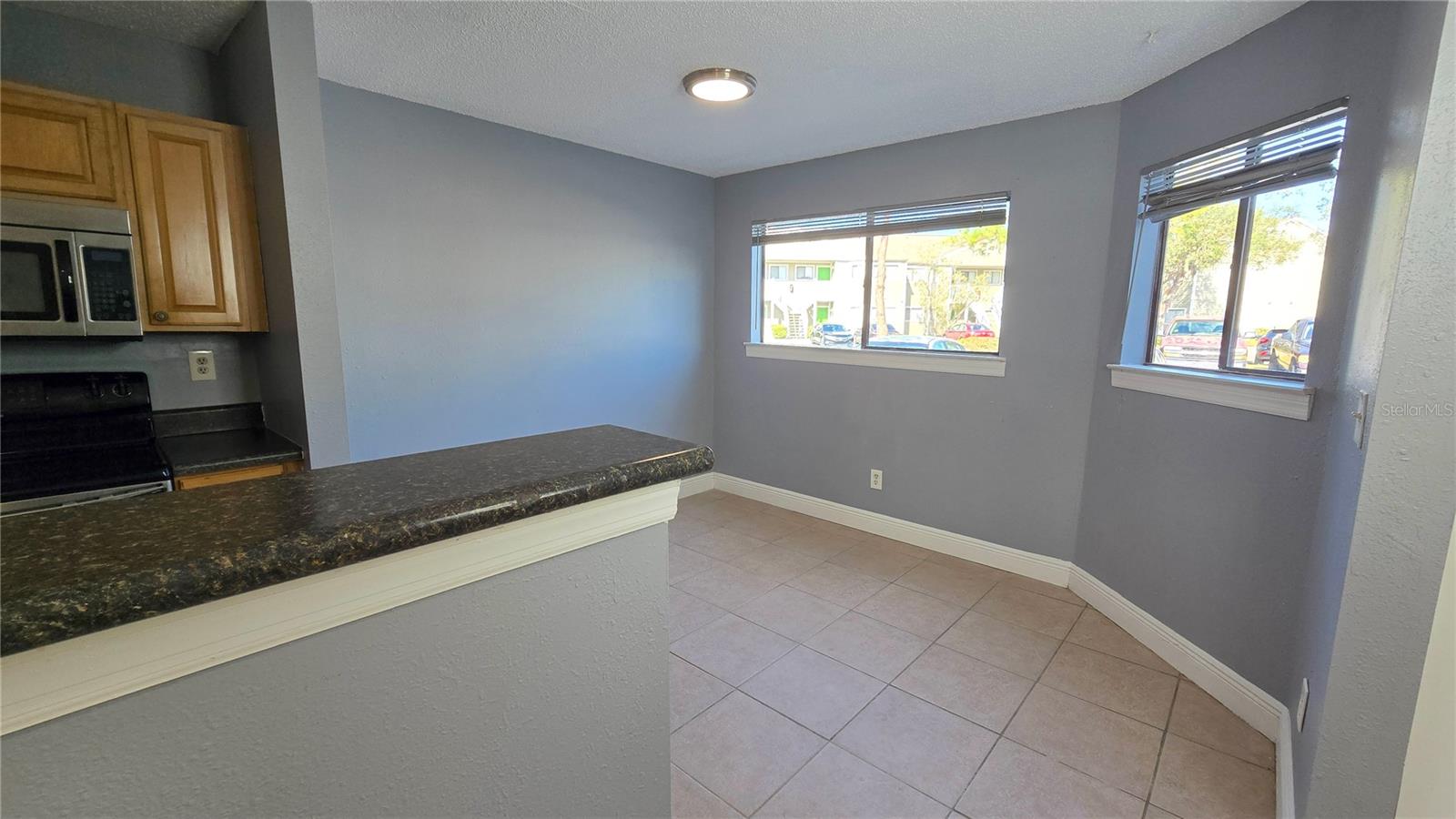 Dining Room off of the kitchen area with plenty of natural lighting.