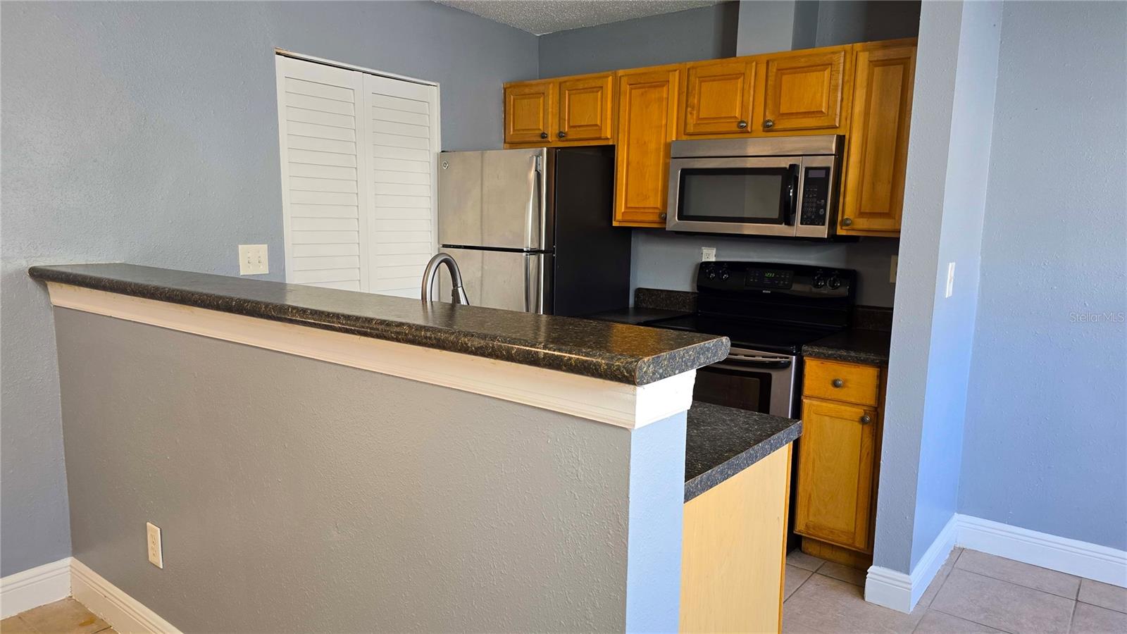 Another view of the kitchen area.