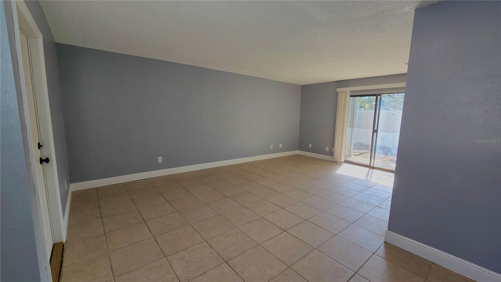 Living Room.  Door on the left is the main front door.