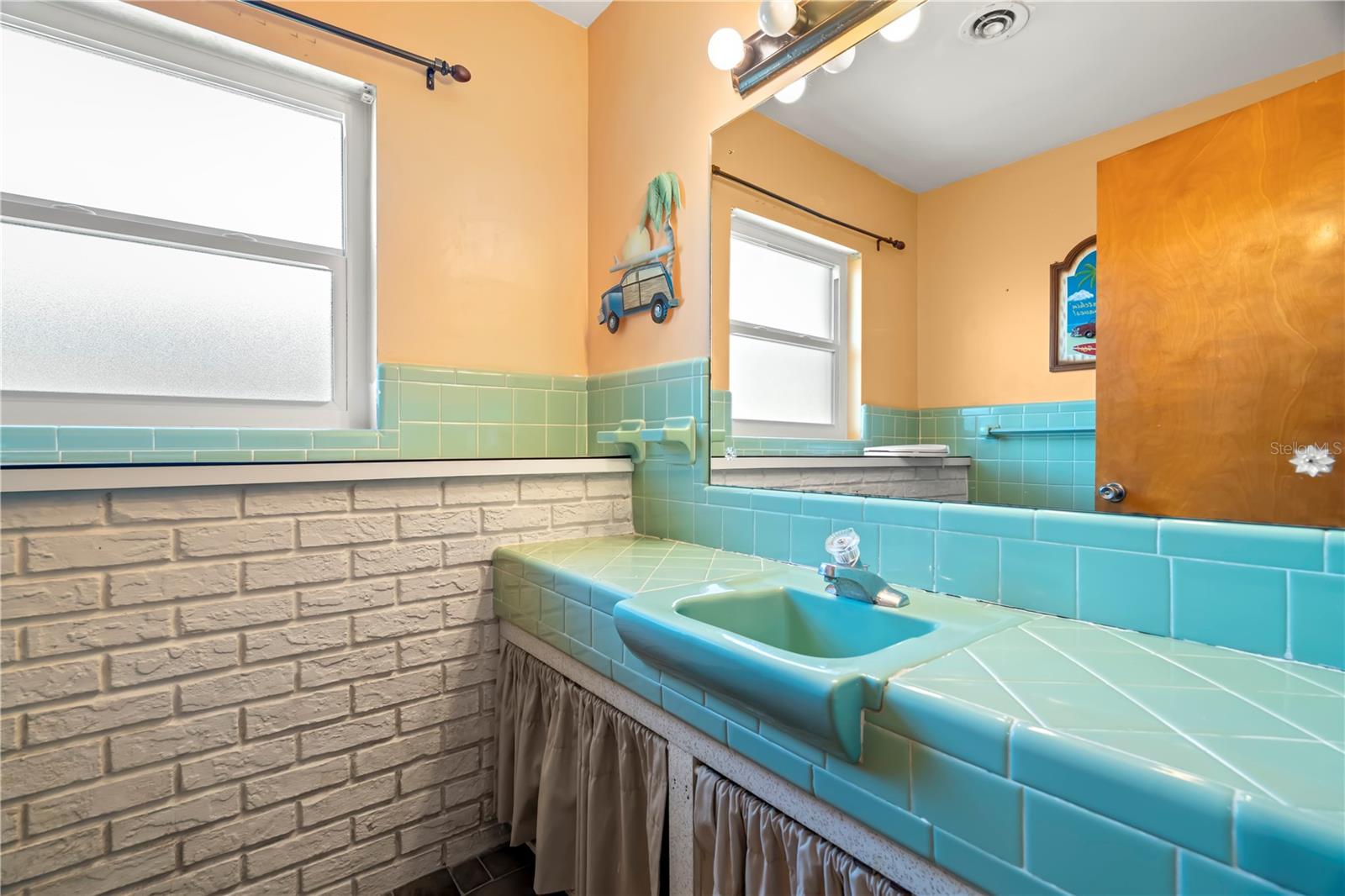 2nd bath is GROOVY! Keep the vintage style or update to a more modern look.