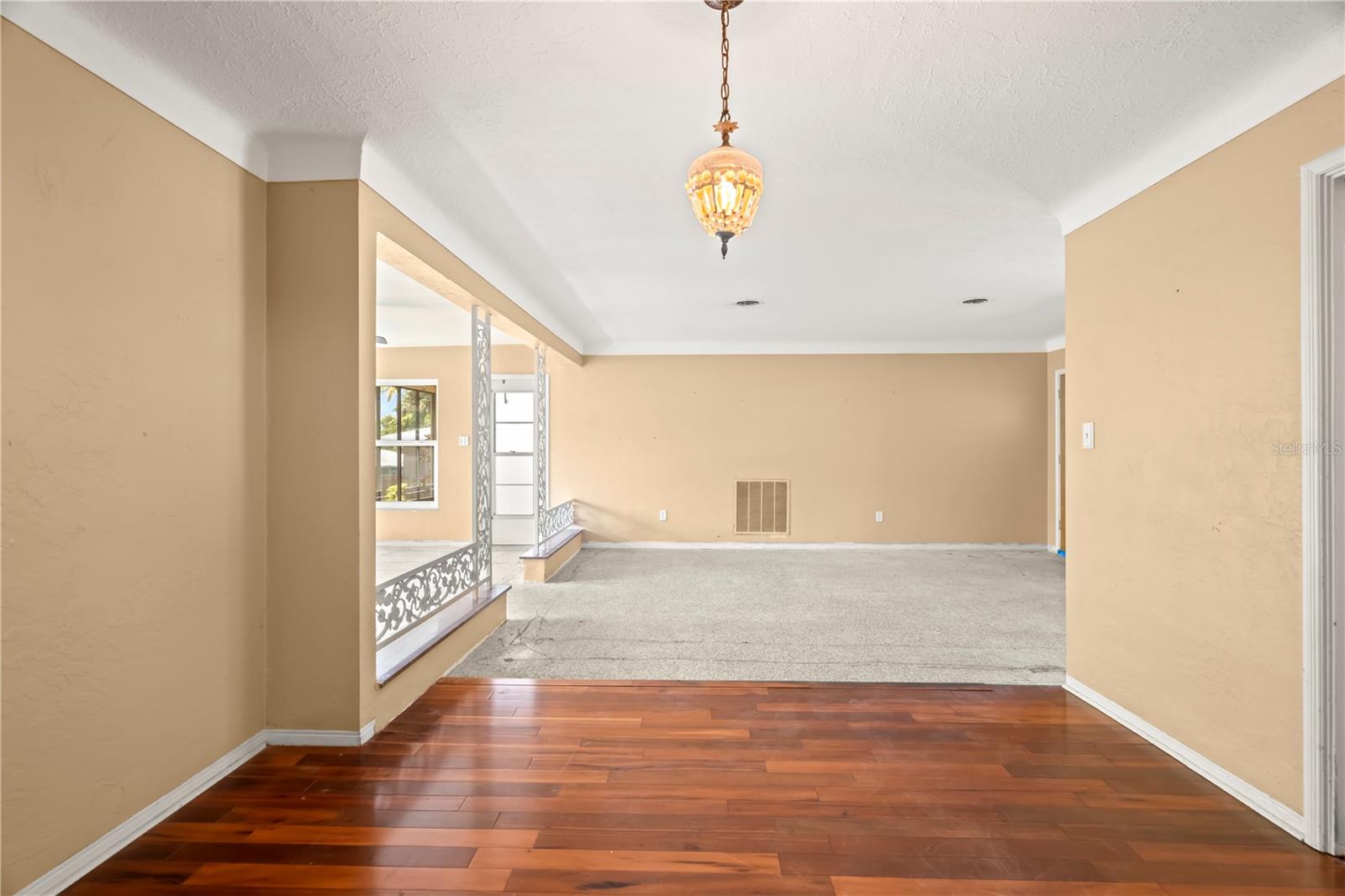 Dining Room with COVED CEILING and Engineered Hardwood flooring