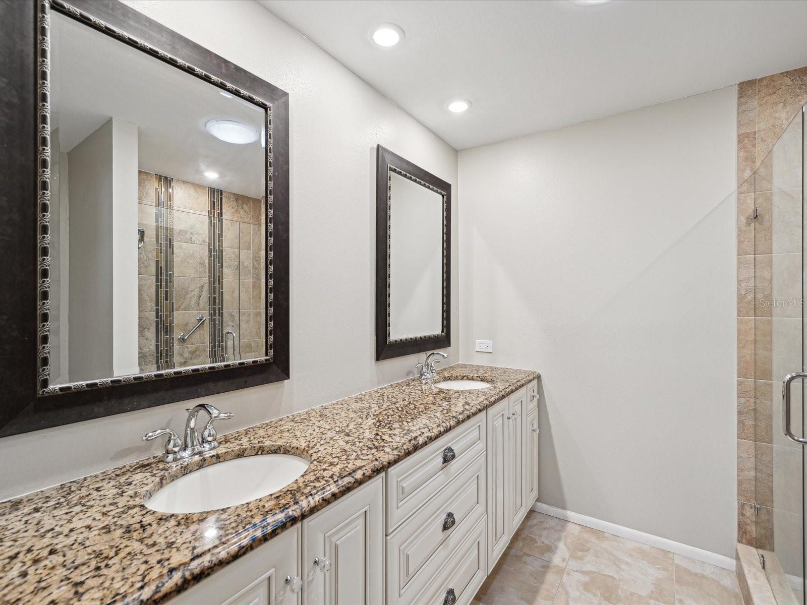 Master bathroom with granite counter tops, soft close drawers and doors