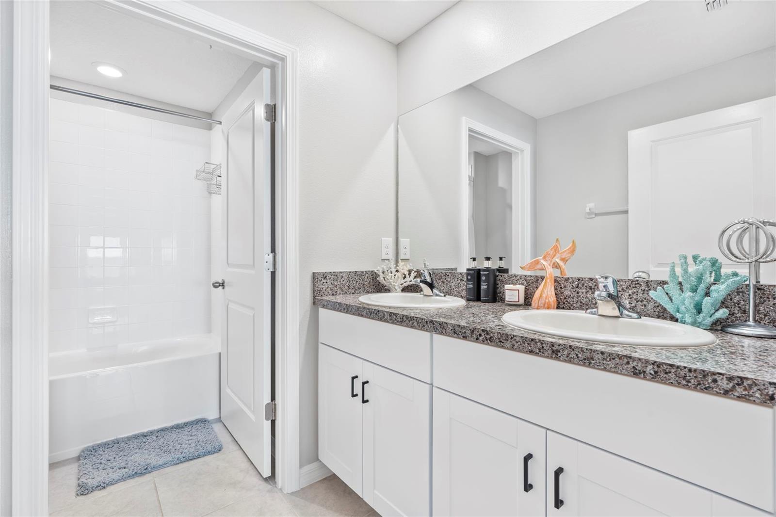 Bathroom with double vanity   13557 Willow Bluestar Lp, Riverview, FL 33579