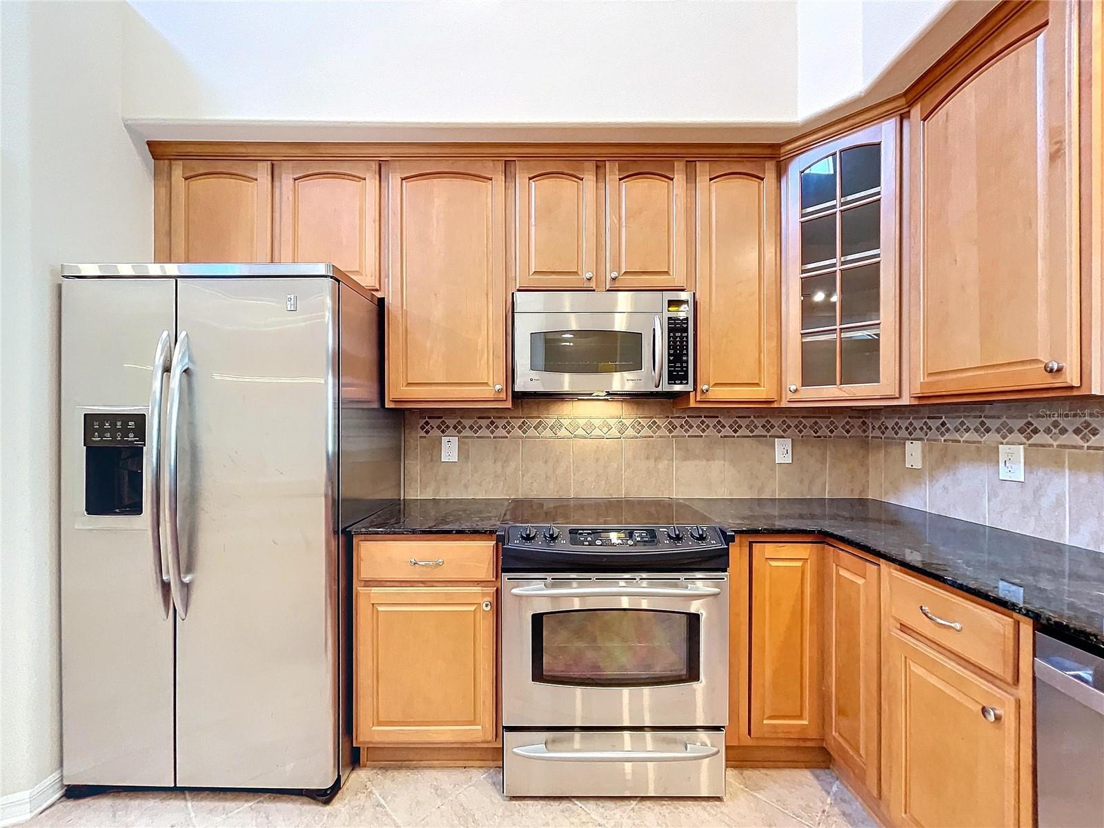 Stainless steel appliances with granite countertop