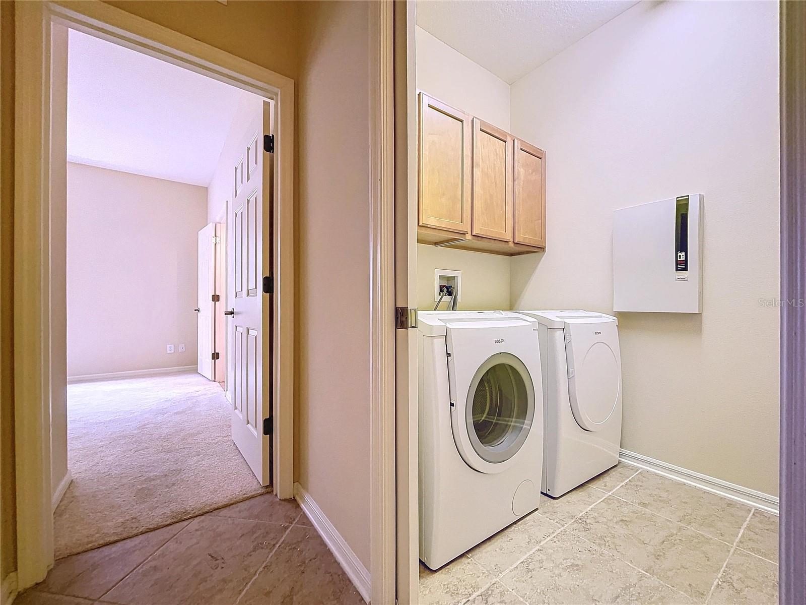 Laundry room is across from 3rd bedroom