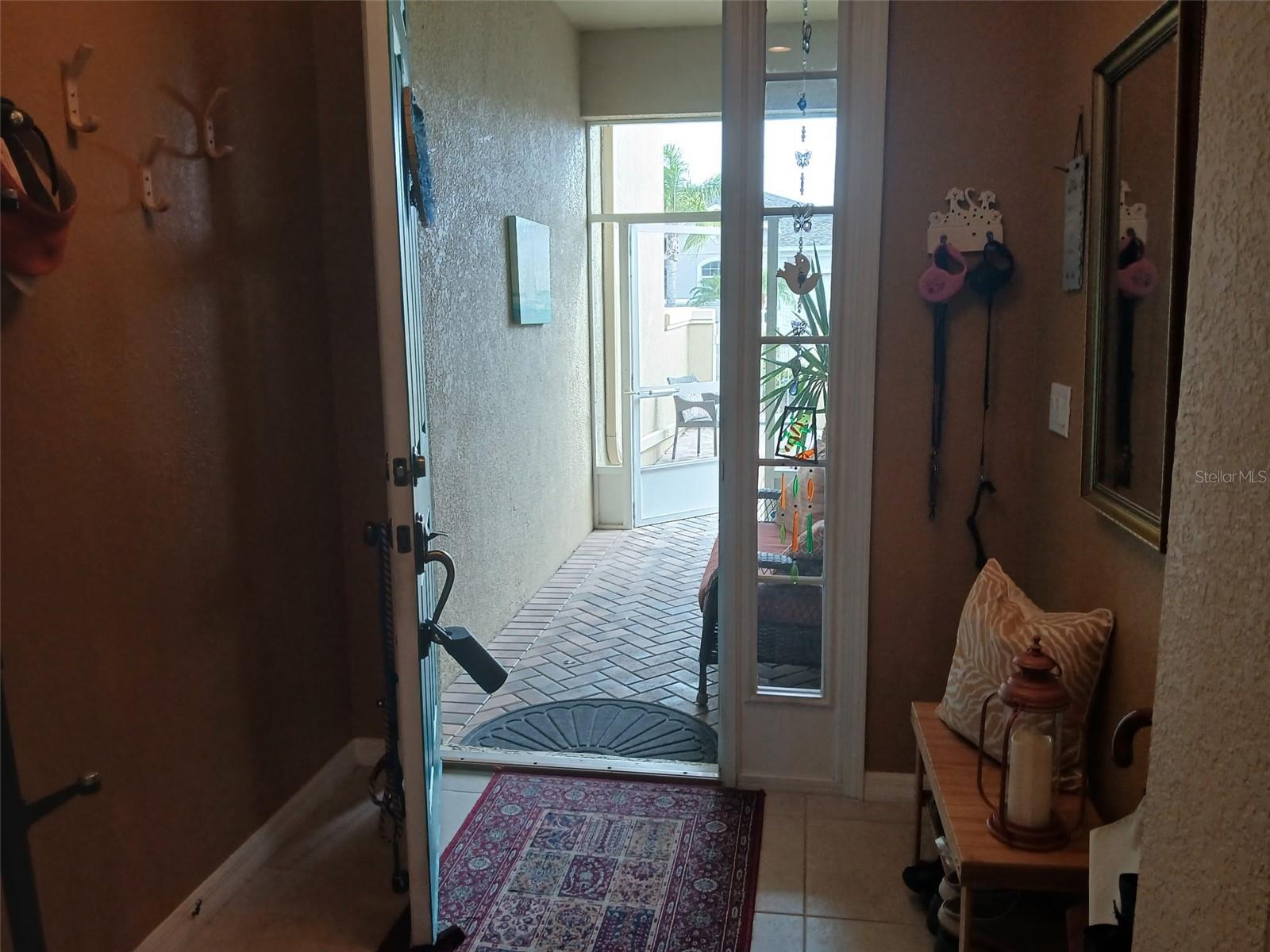 Hallway looking into the screened in porch