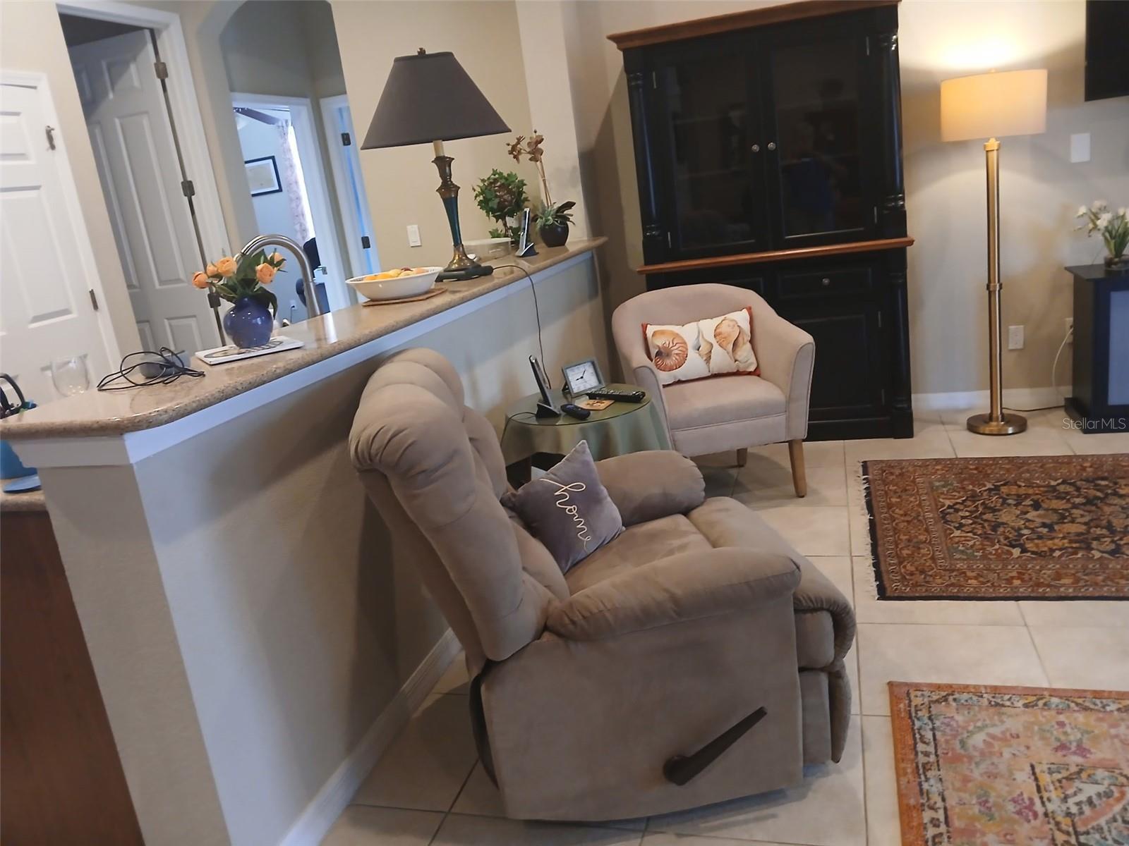 Living area looking into the Kitchen