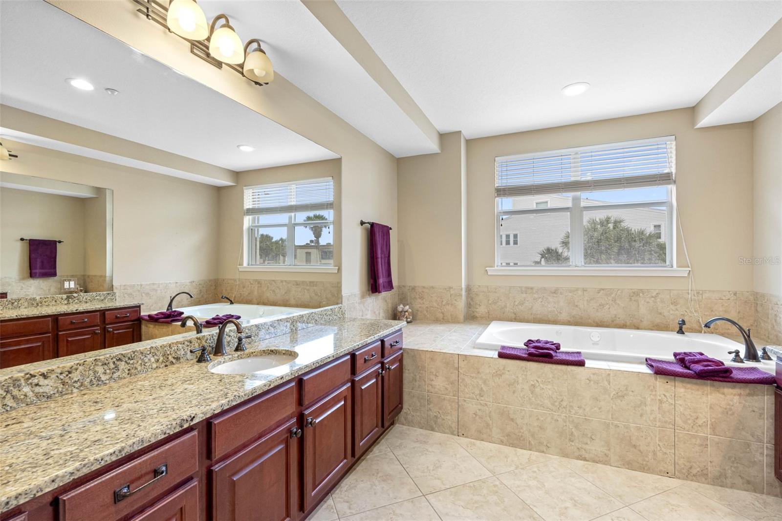 ..Large Master Bathroom with Spa Soaking Tub - His & Hers Vanities - Tray Ceilings 9'3".. Plenty of Natural Light.