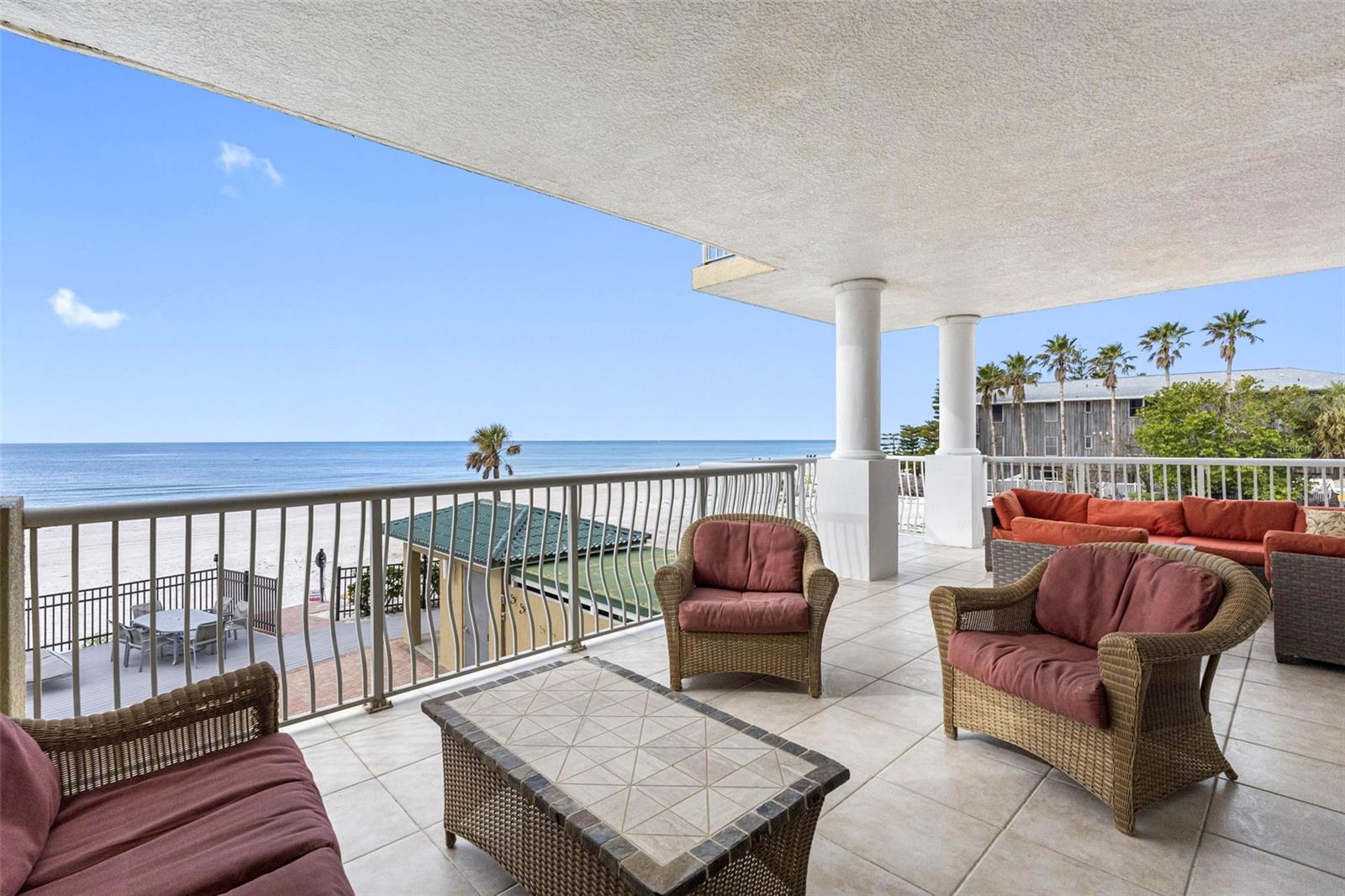 ... Nice Interior Shot.. Looking In From Balcony. 4 Bedroom 3.5 Bath with 3355 Sq Feet of Living Space. Boutique Complex of only 8 Residences. Larger than Most Single Family Beach Front Homes with hassle free Condo Living. I give this Large 5 years and it  should almost double in Value.