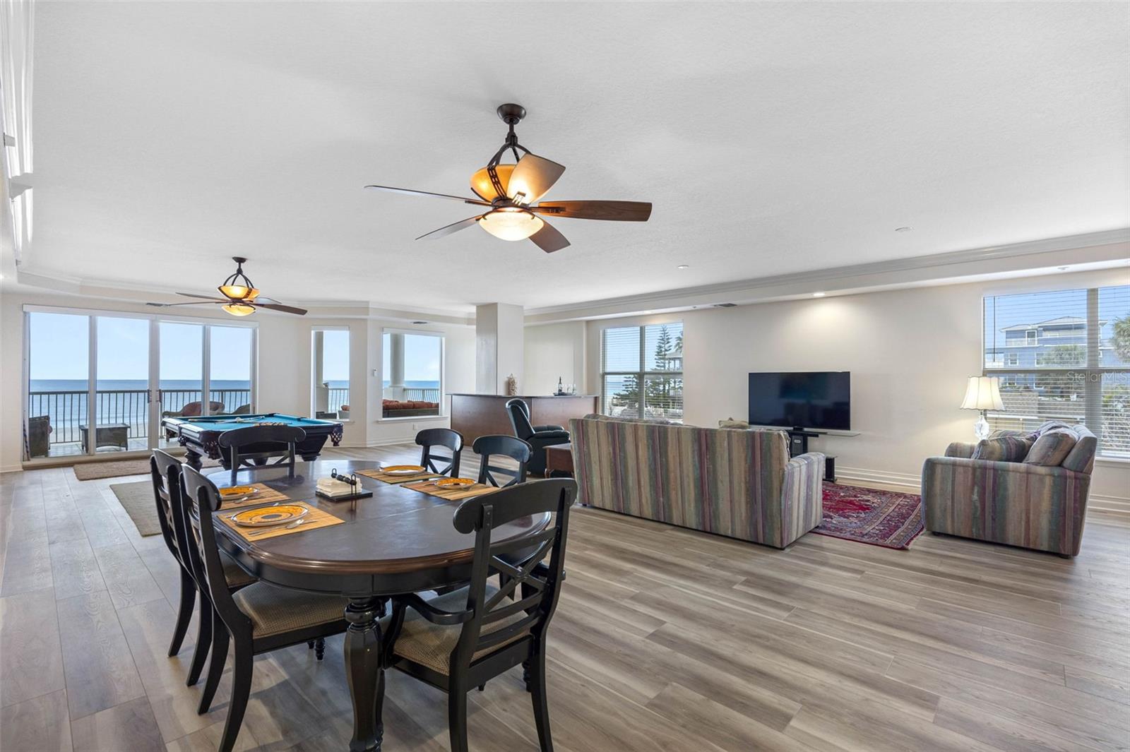 .. Great Room to Kitchen Shot - Looking Due East.. Balcony and Beach Behind us which will be due West with Sunsets..9'3" Tray Ceiling compliment the Great Room Size..