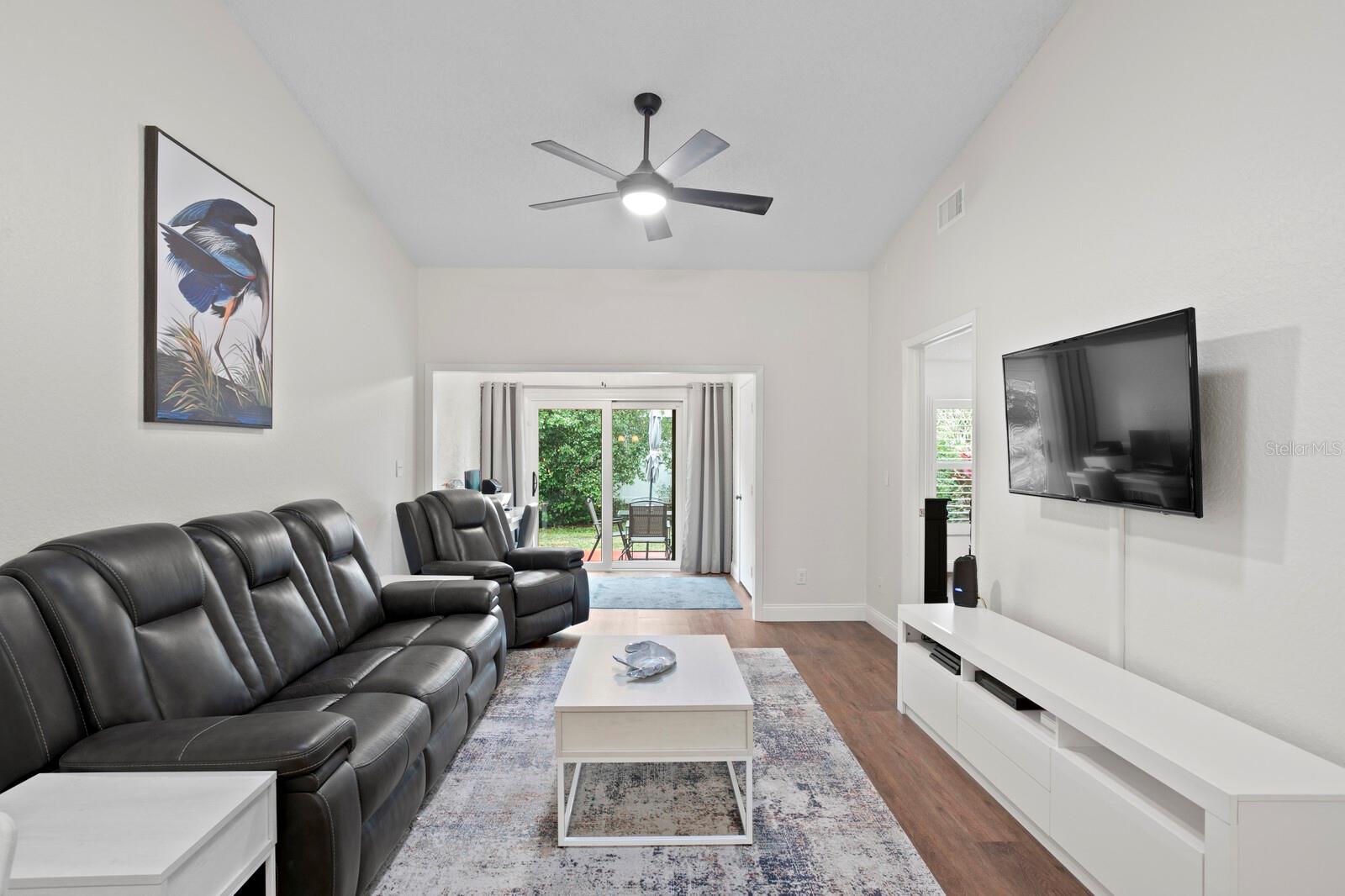 The living room includes a skylight for additional lighting