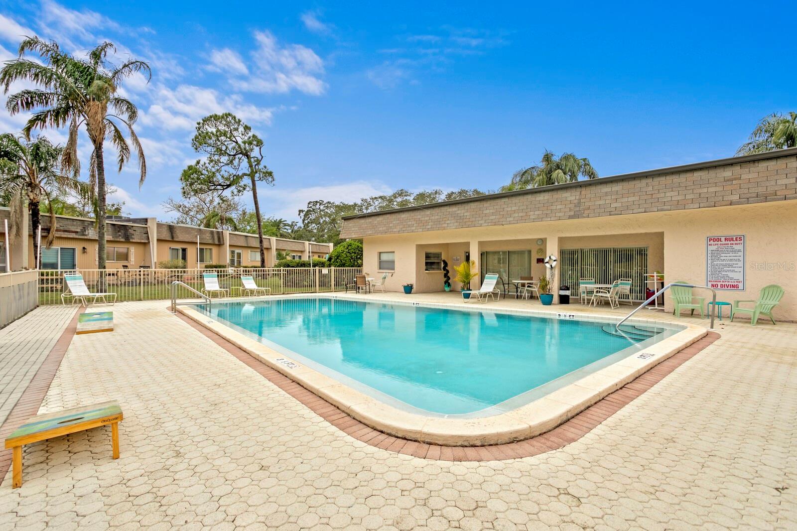 Relax in the large heated community pool