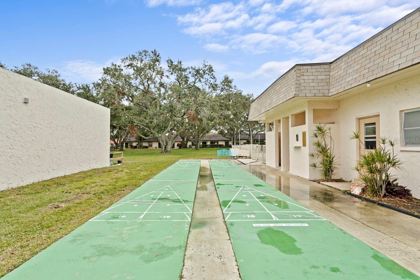 Community shuffleboard courts