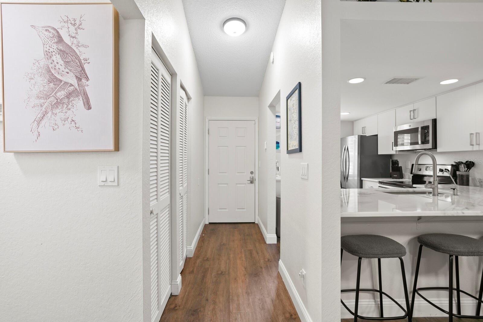 Foyer entry with two storage closets