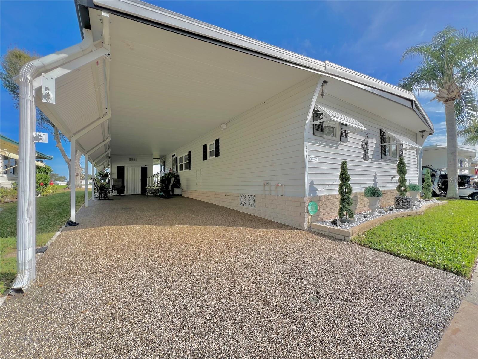 Extended carport with secure fasteners