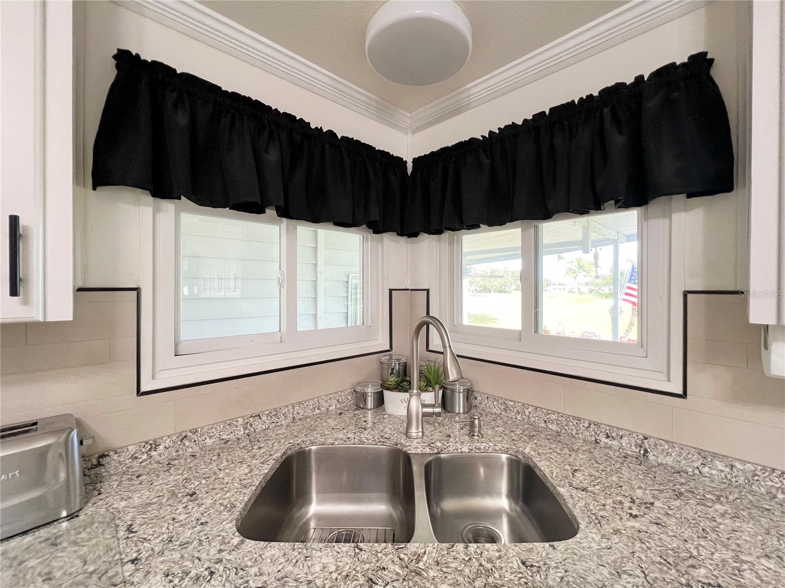 view of the golf course from your kitchen sink.