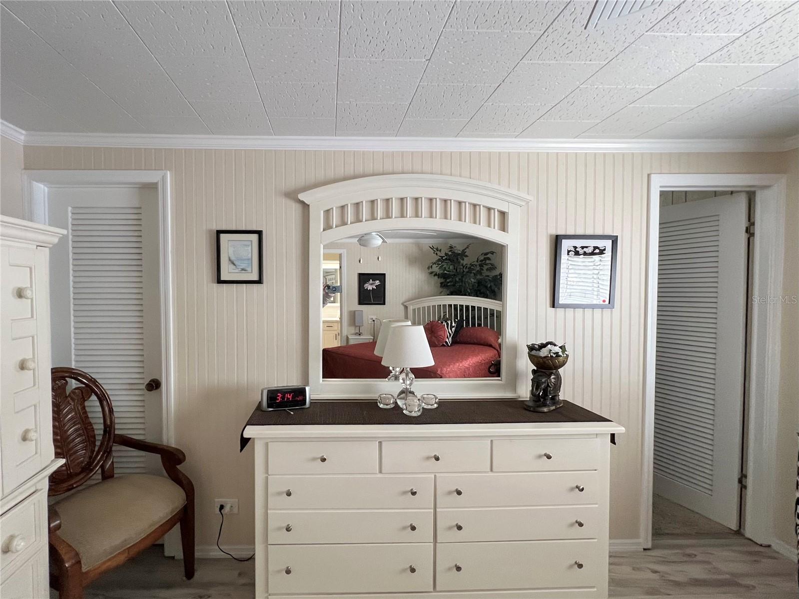 Primary Bedroom with 2 doors to each side of walk-in closet