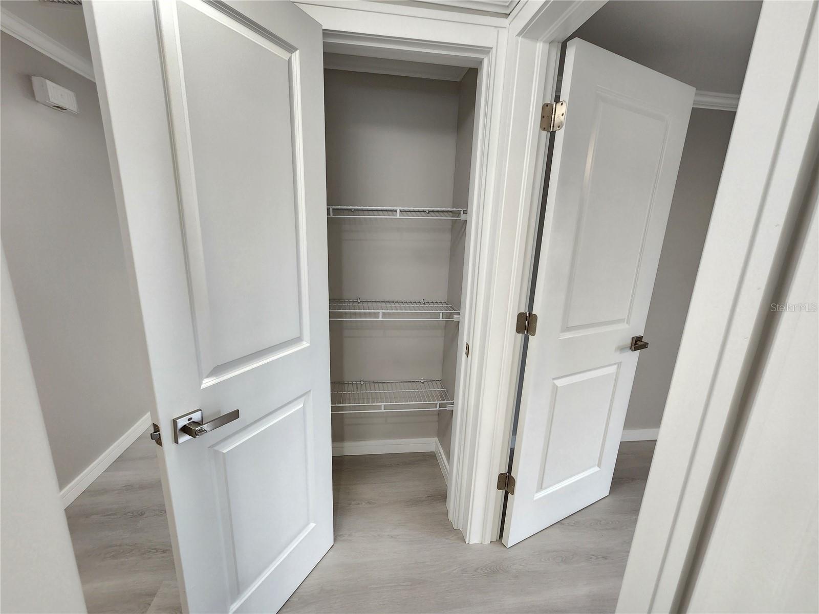 side closet on hallway