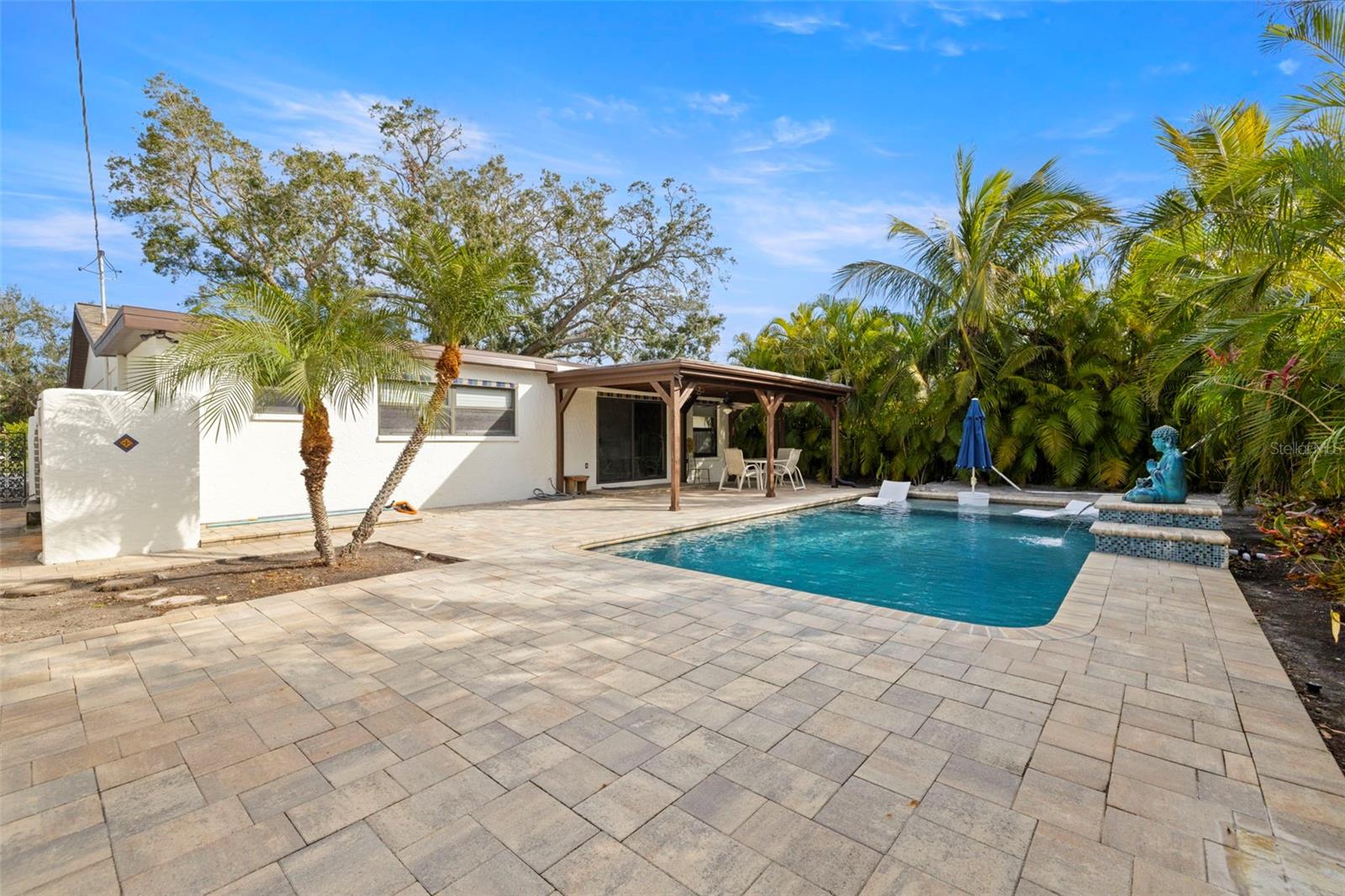 LARGE PATIO WITH PAVERS & UPDATED IN-GROUND POOL