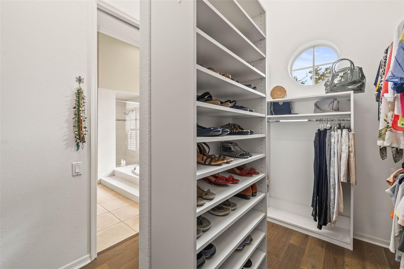 Primary custom walk-in closet