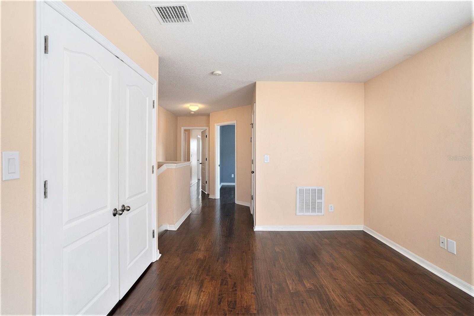 Second floor landing/loft, laundry closet