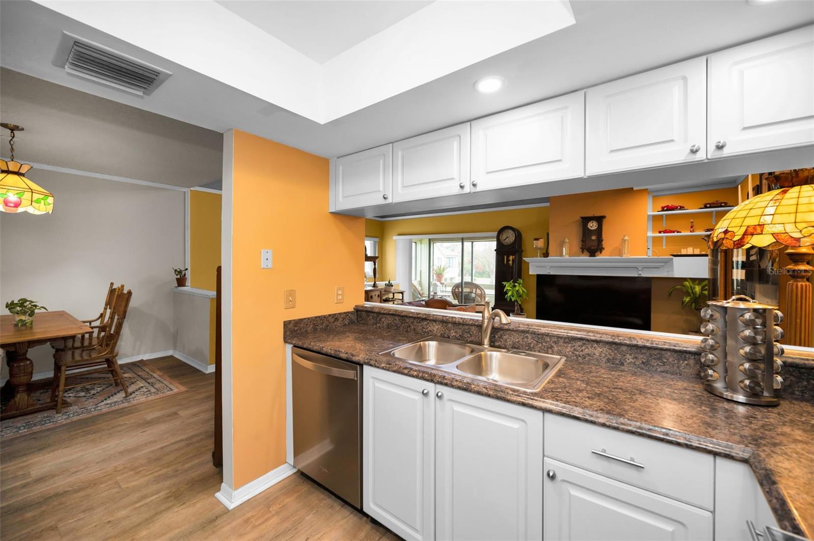 Look out to the living room while cooking.