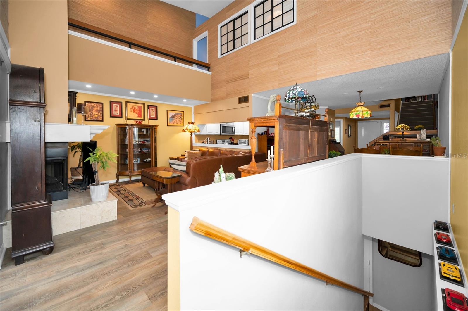 View of Living Room from indoor staircase from the Bonus Room.