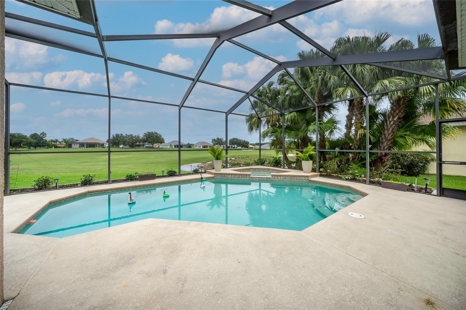 pool looking on to golf course