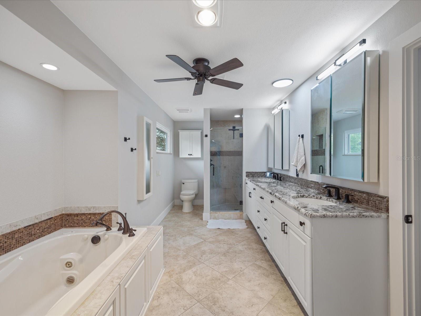 Master bath with dual vanity, tub and shower