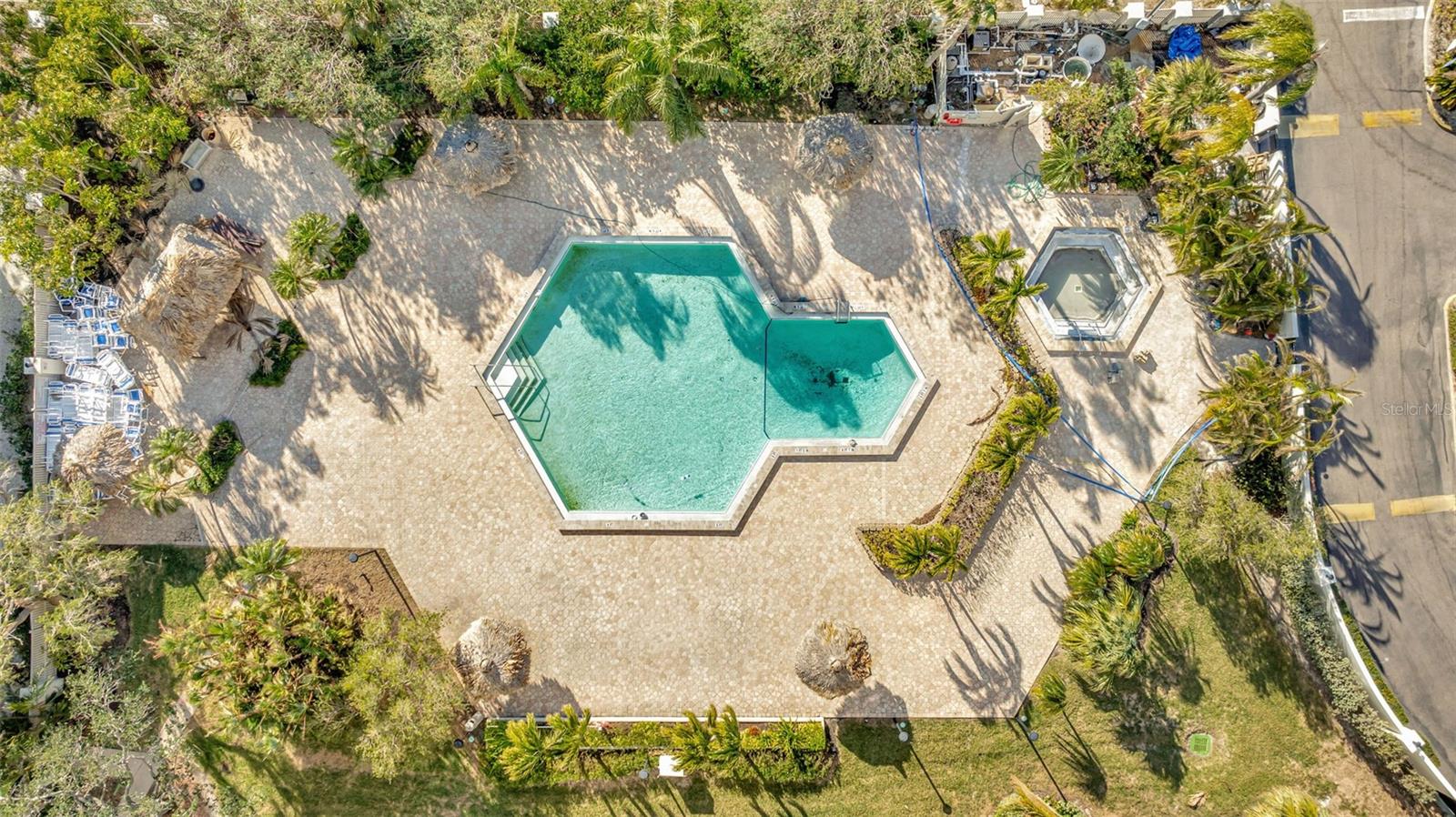 The pool and spa area are large surrounded by Tiki huts for your enjoyment.