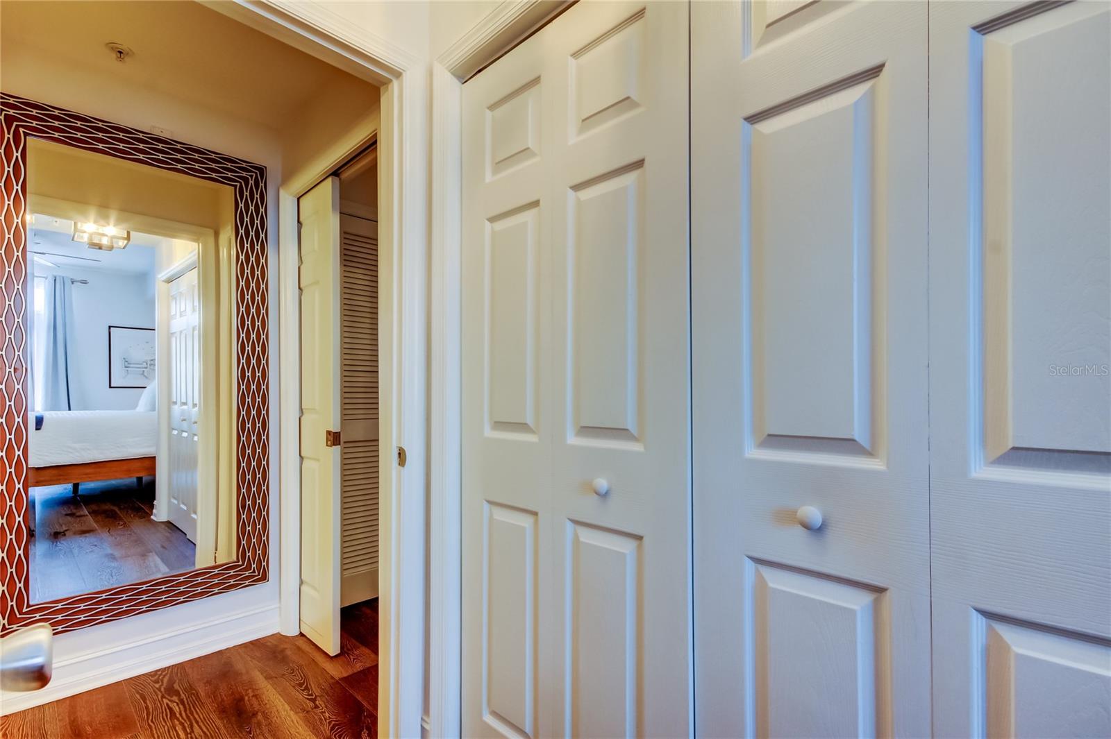 52. Onlooking a Short Hallway Leading from Living Space into Bed/Bath Space.. See the Pocket Door? That adds Great Privacy!