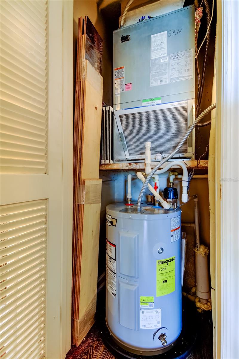 58. Utility Closet is in Hallway.. Housing the HVAC 2016 & Water Heater 2019.. Plus Extra Flooring is in There!