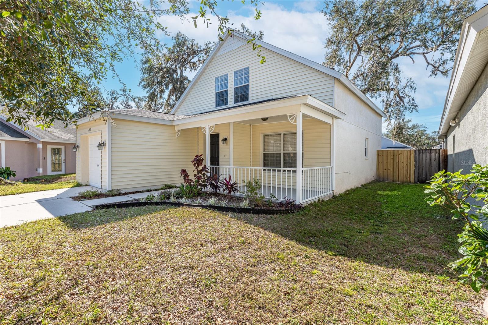 Charming two-story home nestled on a quiet cul-de-sac in the peaceful neighborhood of BLOOMINGDALE RIDGE with a park & playground in Riverview.