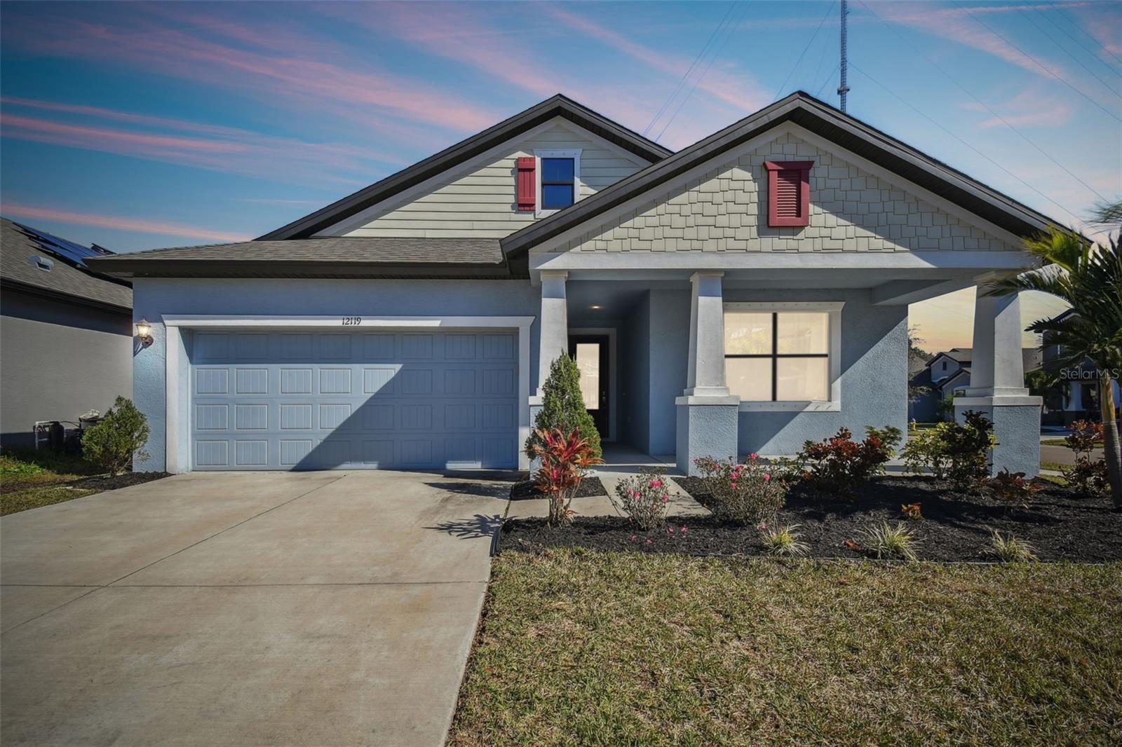 Twilight view of the front of the home.