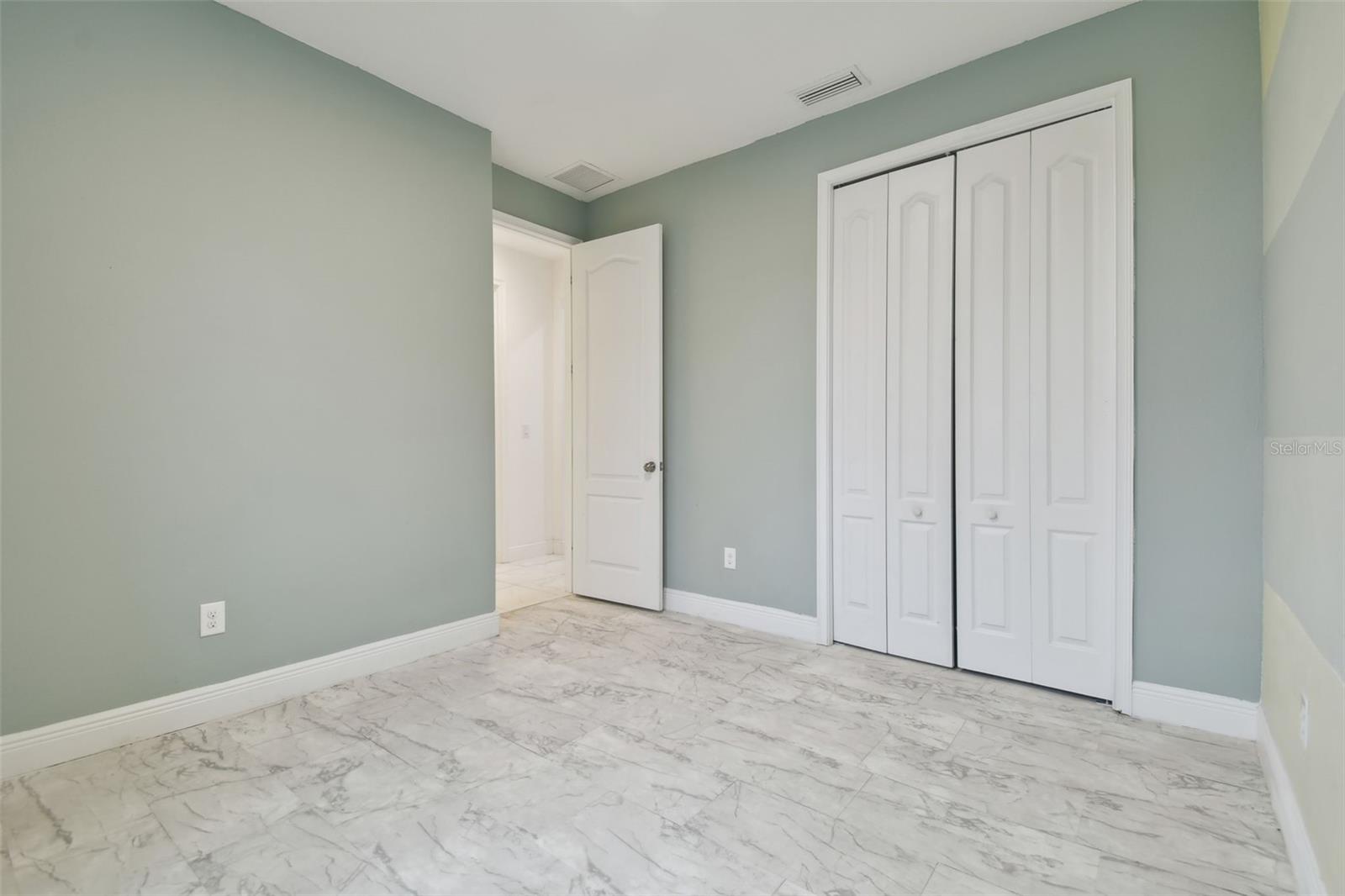 Bedroom 3 with a good sized closet.