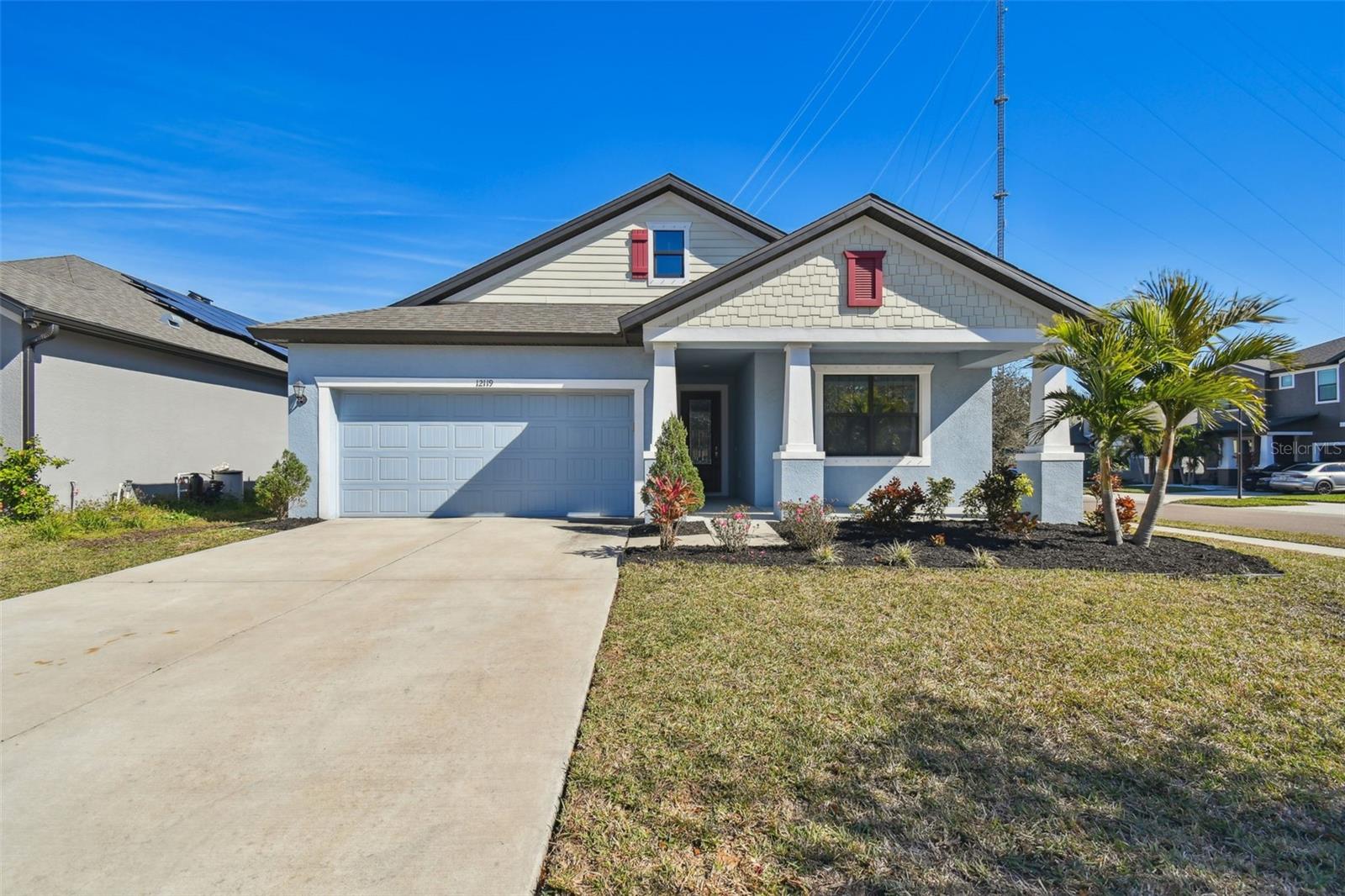 Front view of the home with updated landscaping.