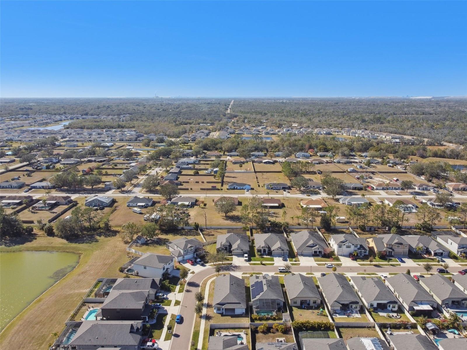 Aerial view from the East to the rear of the home.