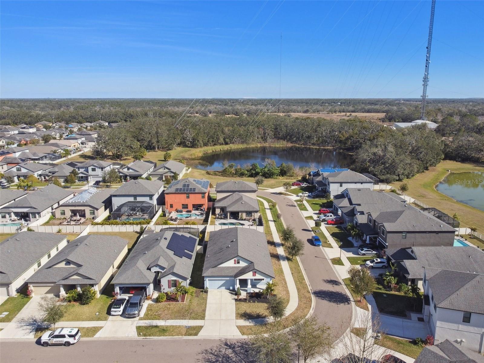 Aerial view from the West towards the home.