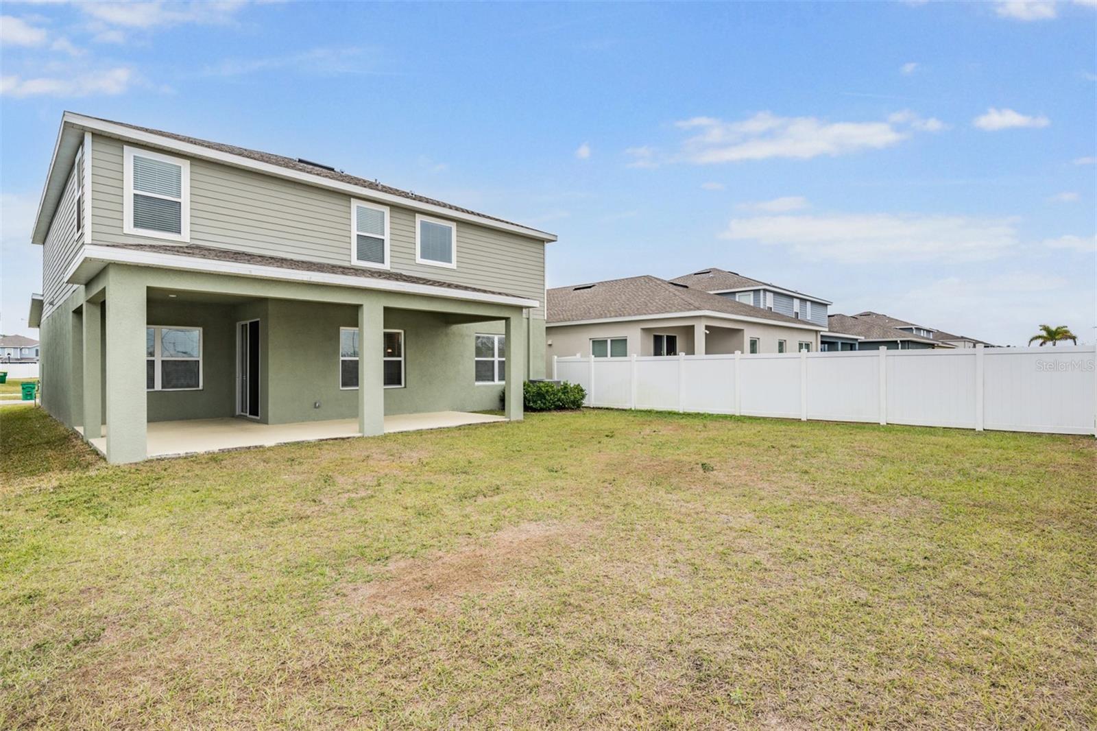 Large Backyard with extended lanai