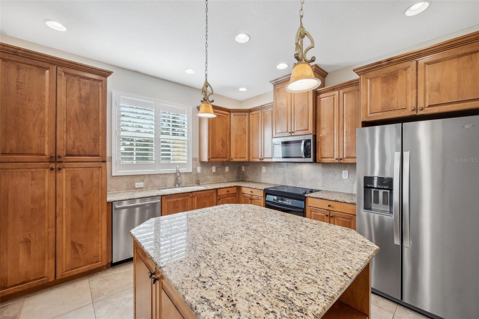 Maple cabinetry and granite countertops!