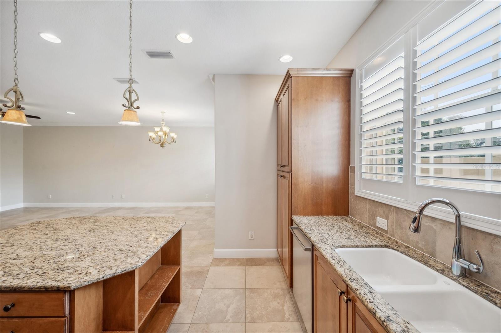 Bright kitchen, with window over the sink and large, custom island!