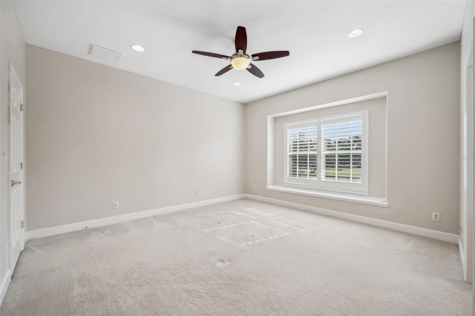 Primary Bedroom with large window with seat built-in