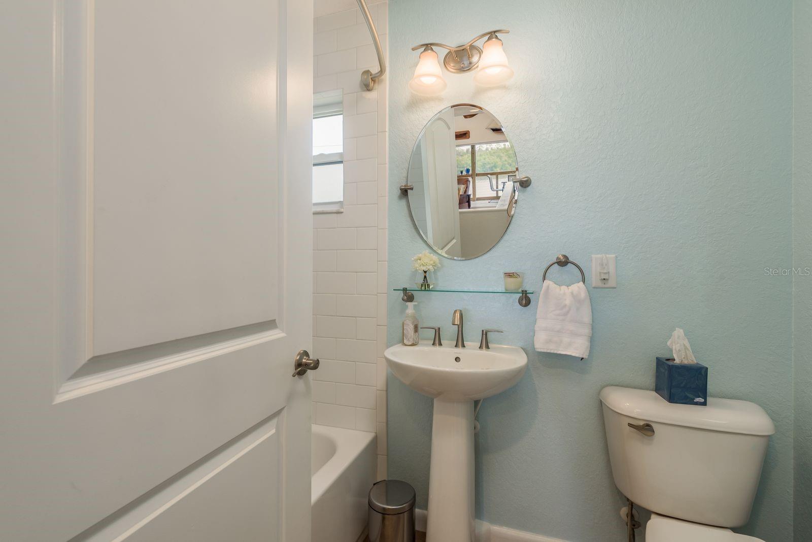 Guest bath includes tub shower combo