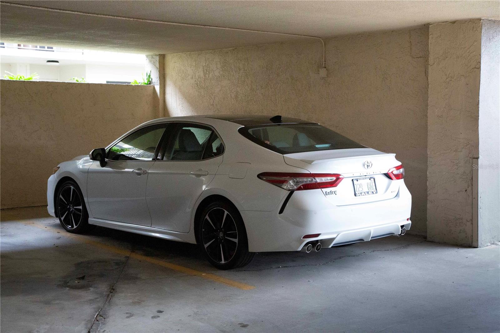 Covered under building parking space