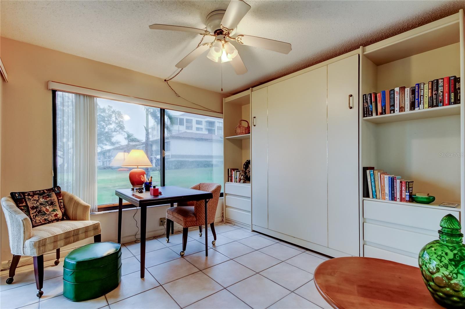 Guest Bedroom with Queen Murphy Bed and desk for an office area