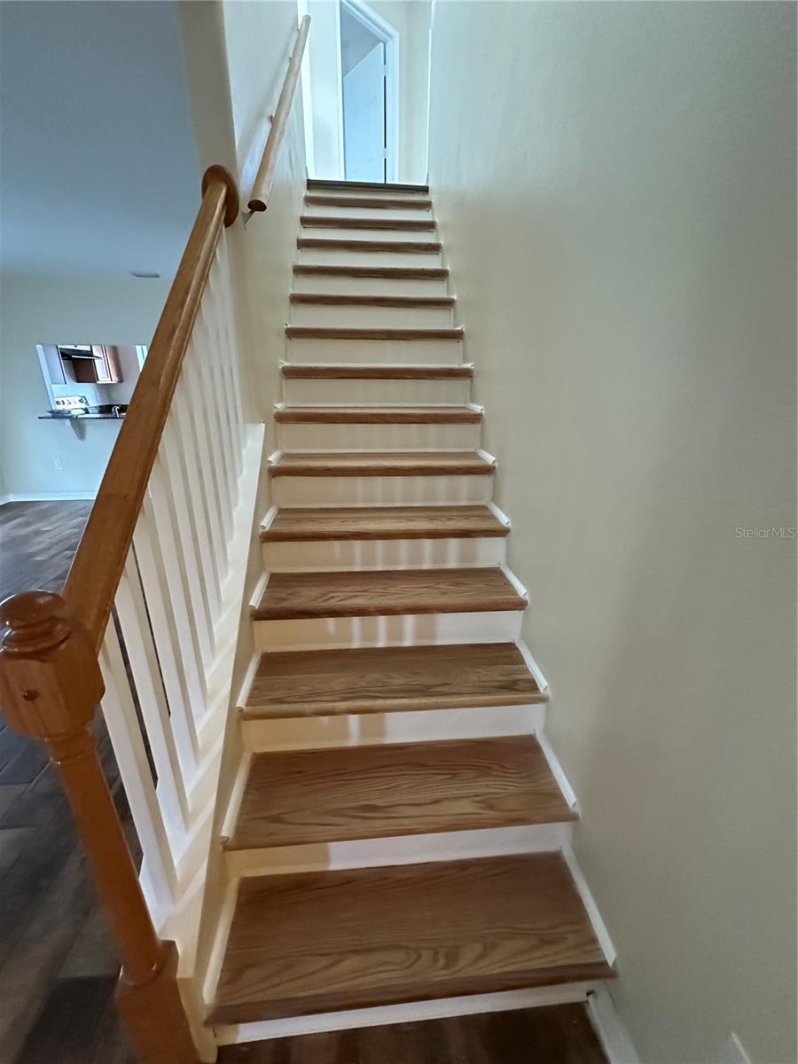 Stairs Leading to the Loft and Upstairs Bedrooms and Bathroom