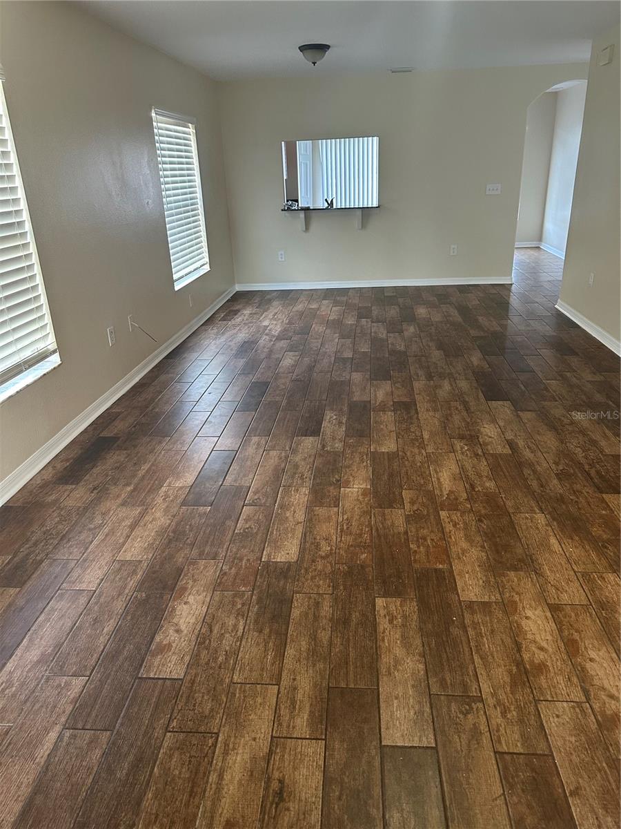 View From Front Door of Spacious Living Room and Dining Area