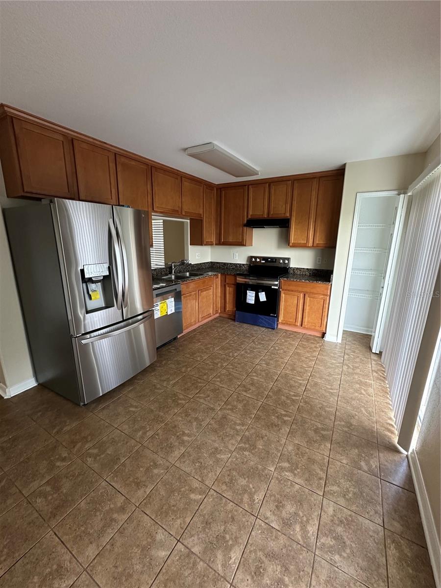 View of Kitchen from Corner Showing Plenty of Space for a Table