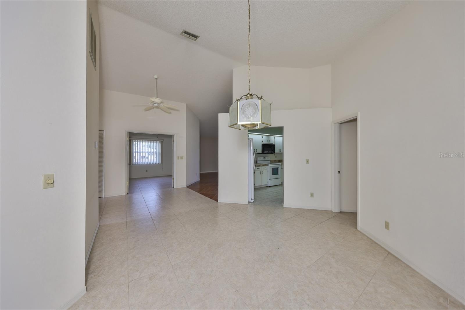 DINING ROOM TO DEN AND KITCHEN