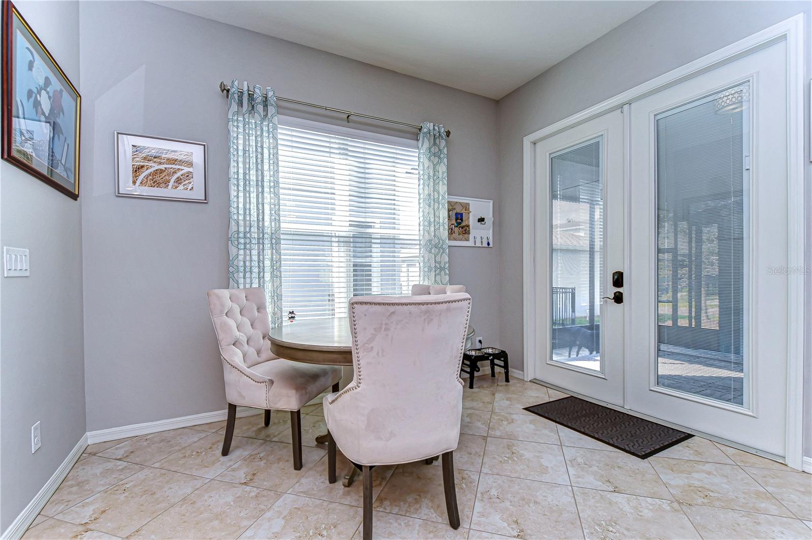 Cozy dining nook with lanai access.